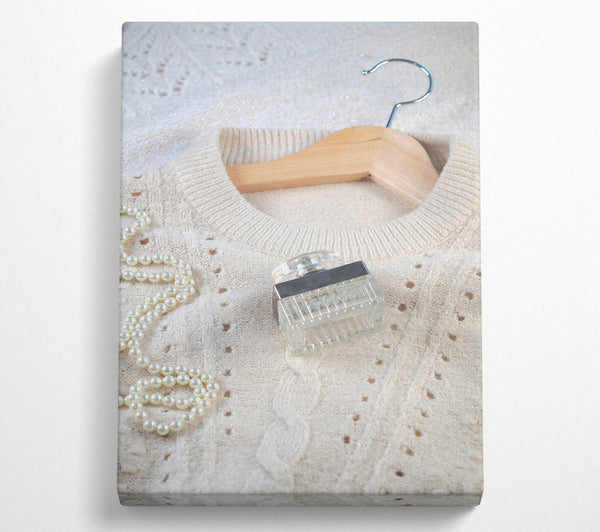  A Canvas Print of Ivory Knit And Perfume Canvas Wall Art