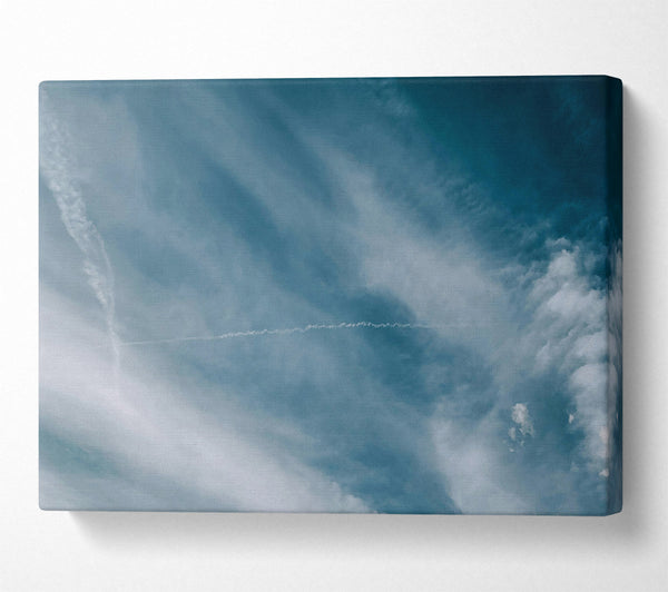  A Canvas Print of Teal Sky Trails Canvas Print