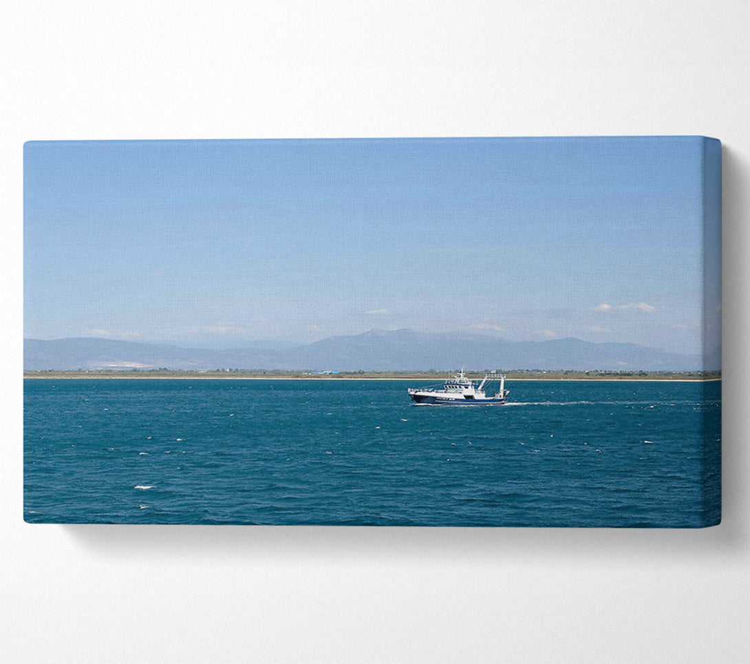  A Canvas Print of Blue Horizon Boat Canvas Print