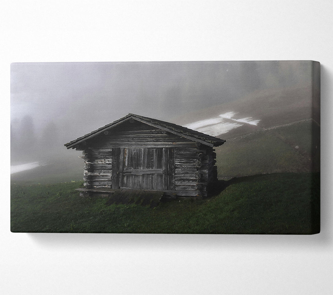  A Canvas Print of Grey Cabin In Mist. Canvas Print