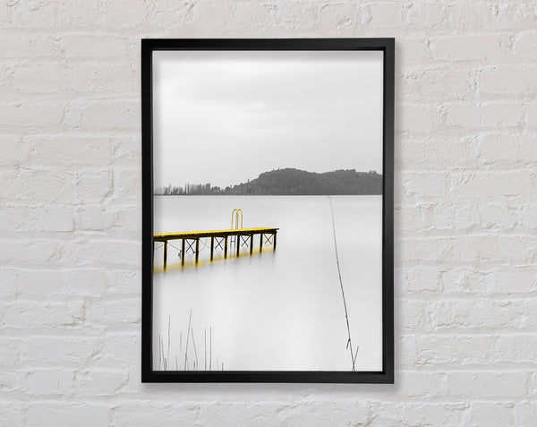 Pier In To The Lake Framed Print