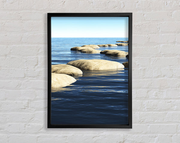 Rocks In The Calm Sea Framed Print