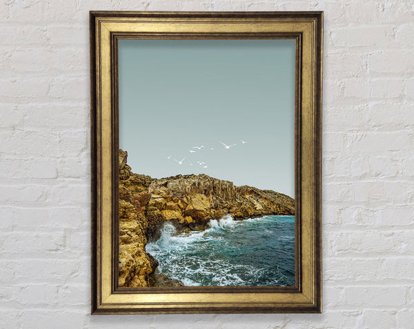 White Birds Fly Over Cliffs Framed Print