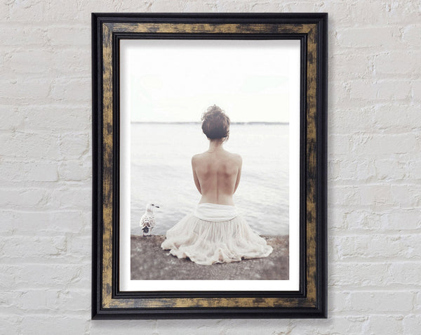 Woman Looking Out To Sea Framed Print