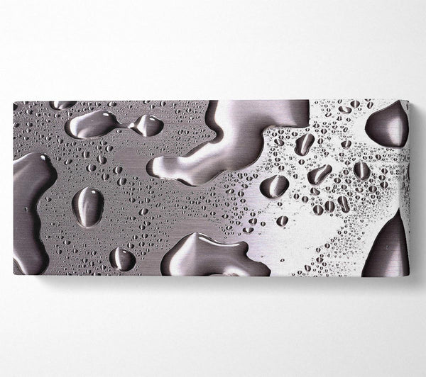 Water Drops On Silver Surface