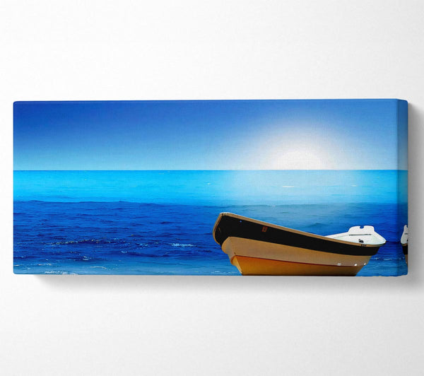 Sail Boat On The Crystal Ocean Shoreline