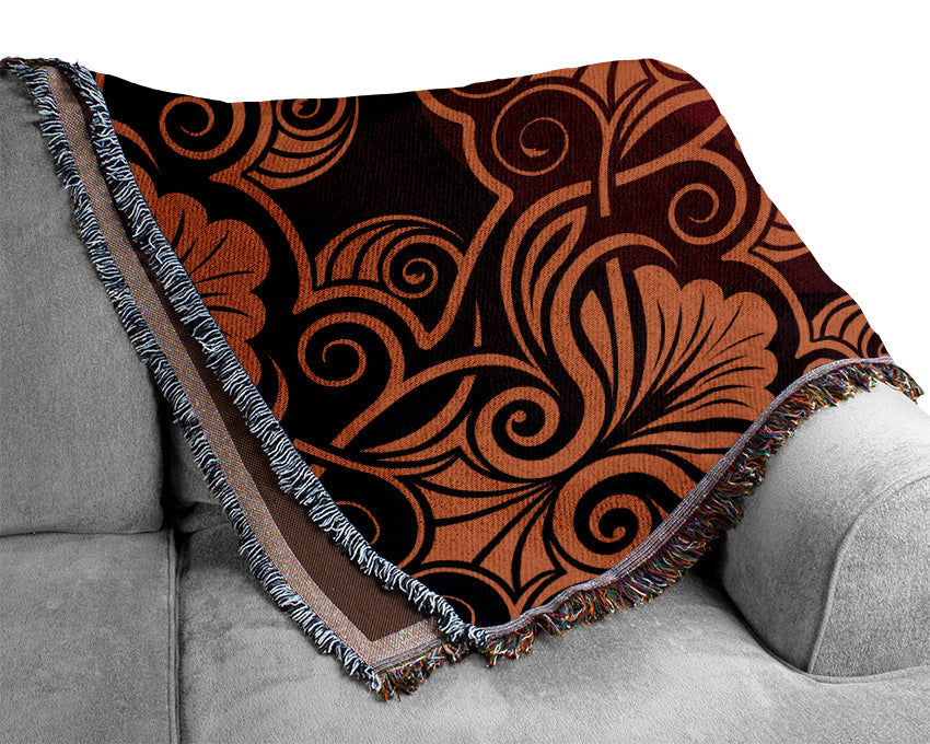 Symmetrical Reds Woven Blanket