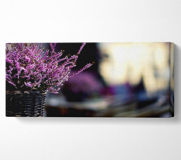 Purple Flowers In A Basket