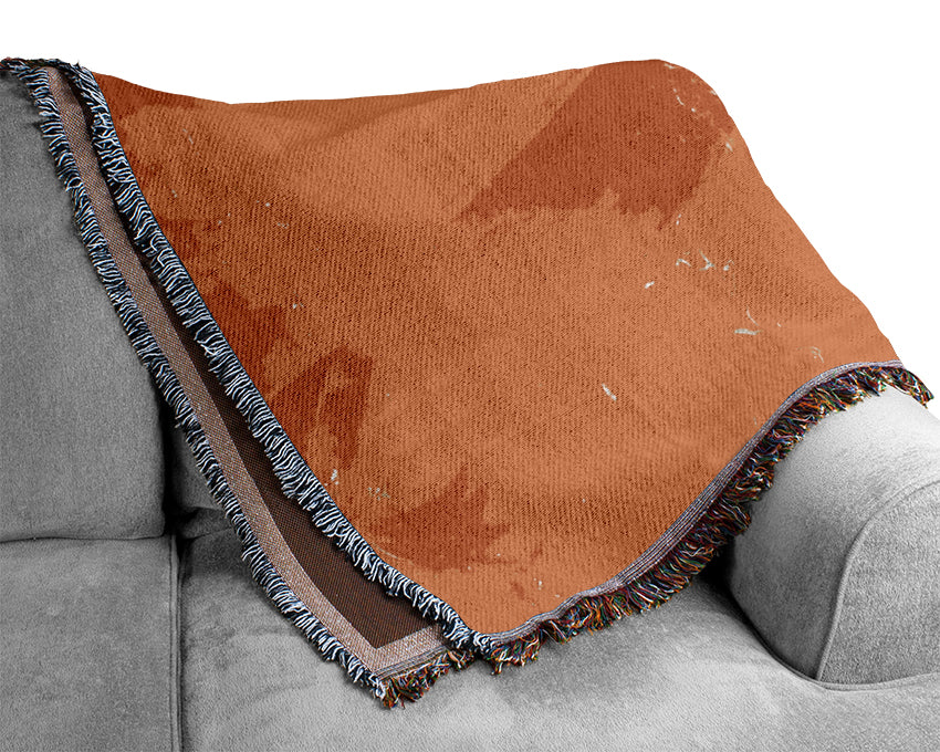 The Centre Of An Orange Woven Blanket