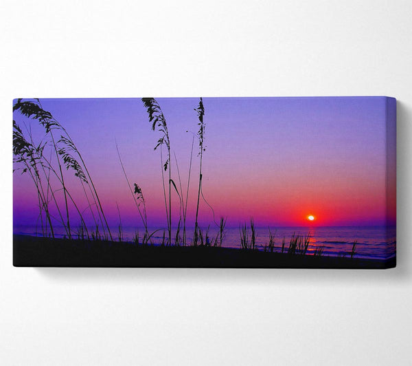 Red Sunset Over The Purple Lake
