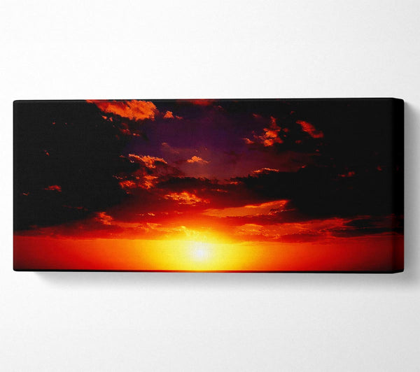 Sunset Through The Black Ocean Clouds