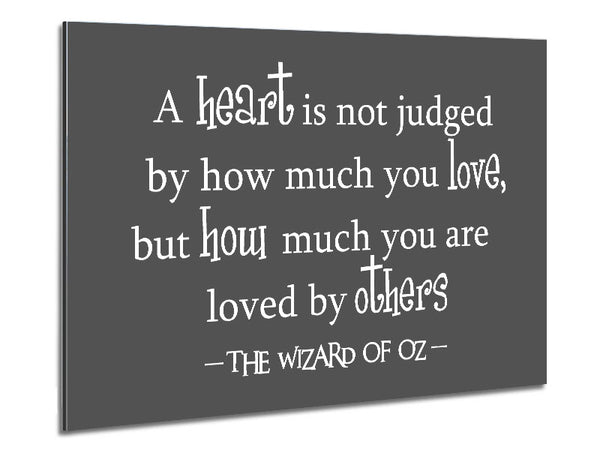 Movie Quote Wizard Of Oz A Heart Is Not Judged Grey Metal Print