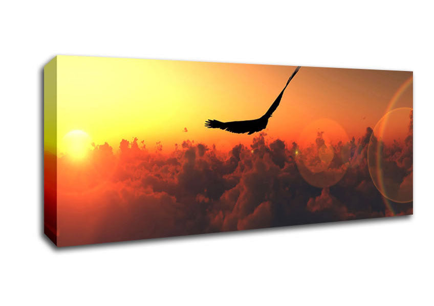 Picture of Eagle Flying In The Burnt Orange Sky Panoramic Canvas Wall Art