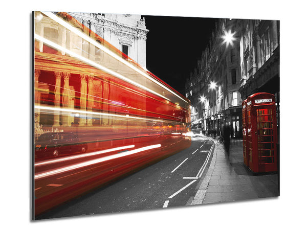 Red Bus Speeding Through The City Metal Print