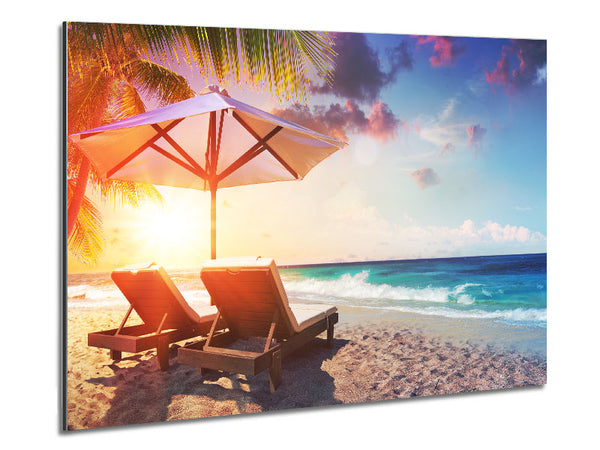 Sun chairs by the sea Metal Print
