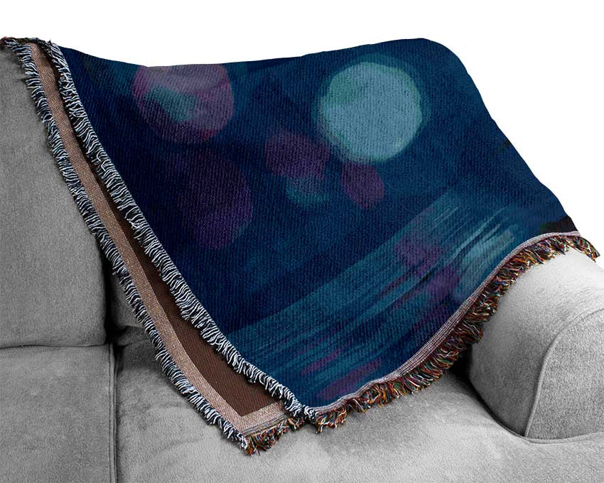 Spores of light from a lilly Woven Blanket