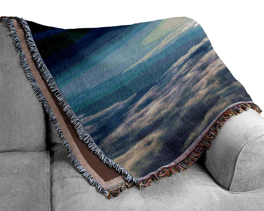 The sun above the clouds and atmostphere Woven Blanket