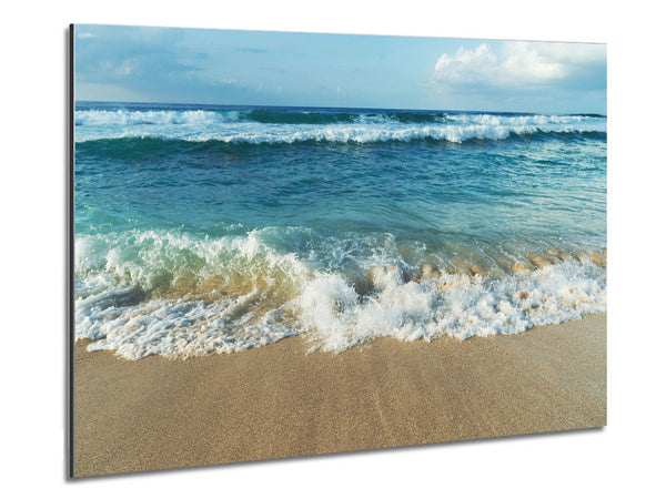Crashing waves on the sandy beach Metal Print