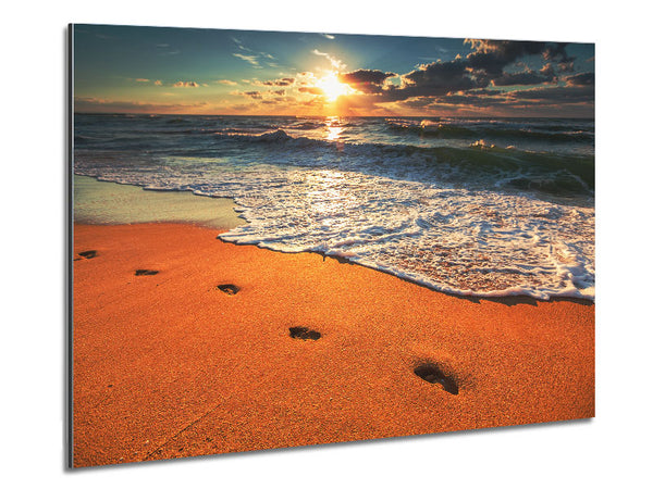 Footprints on the beach Metal Print