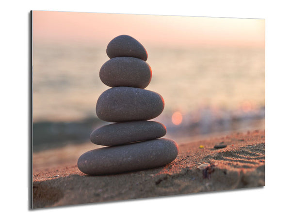 Zen stones stacked up on beach Metal Print