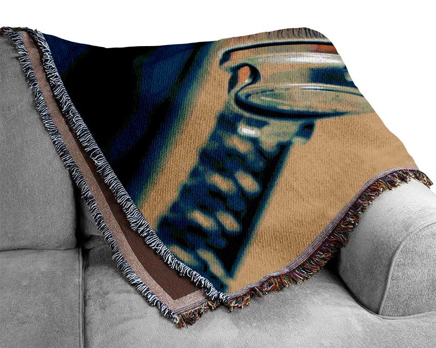 headpgones on the table Woven Blanket