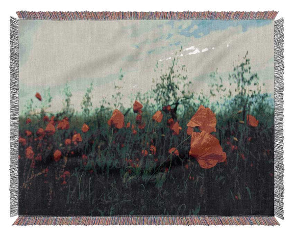 Red poppies on a windy day Woven Blanket