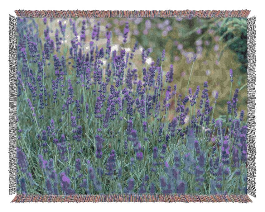 Purple flowers in the meadow spring Woven Blanket