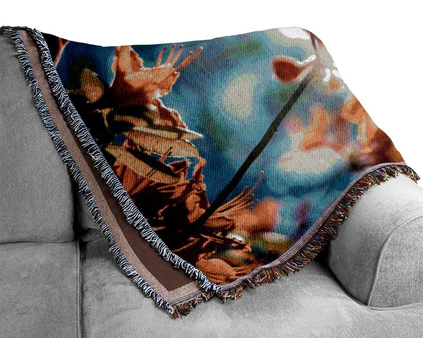 Sun shinging through the twigs and leaves Woven Blanket