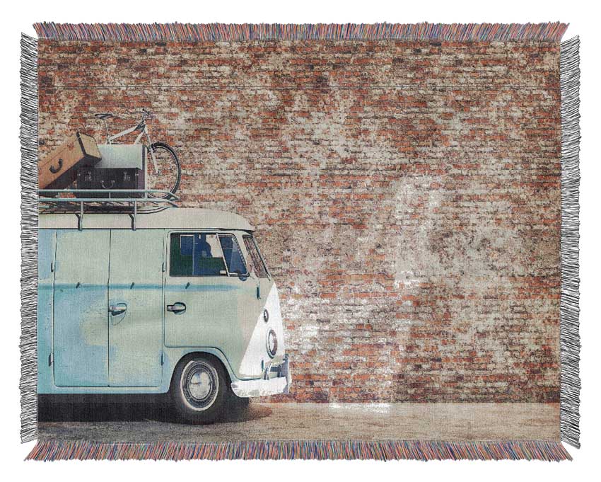 The Camper In Front Of Bricks Woven Blanket