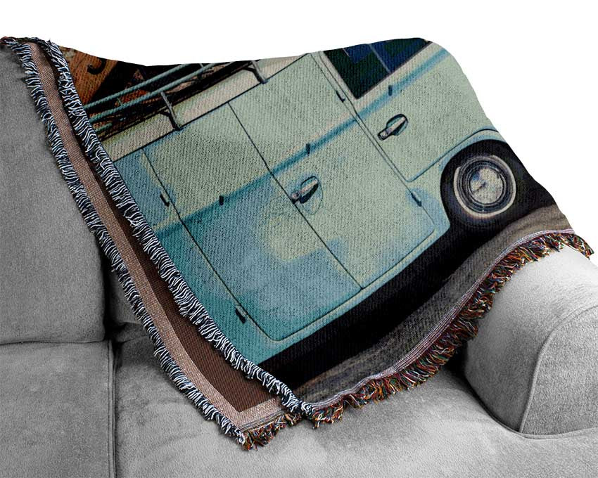 The Camper In Front Of Bricks Woven Blanket