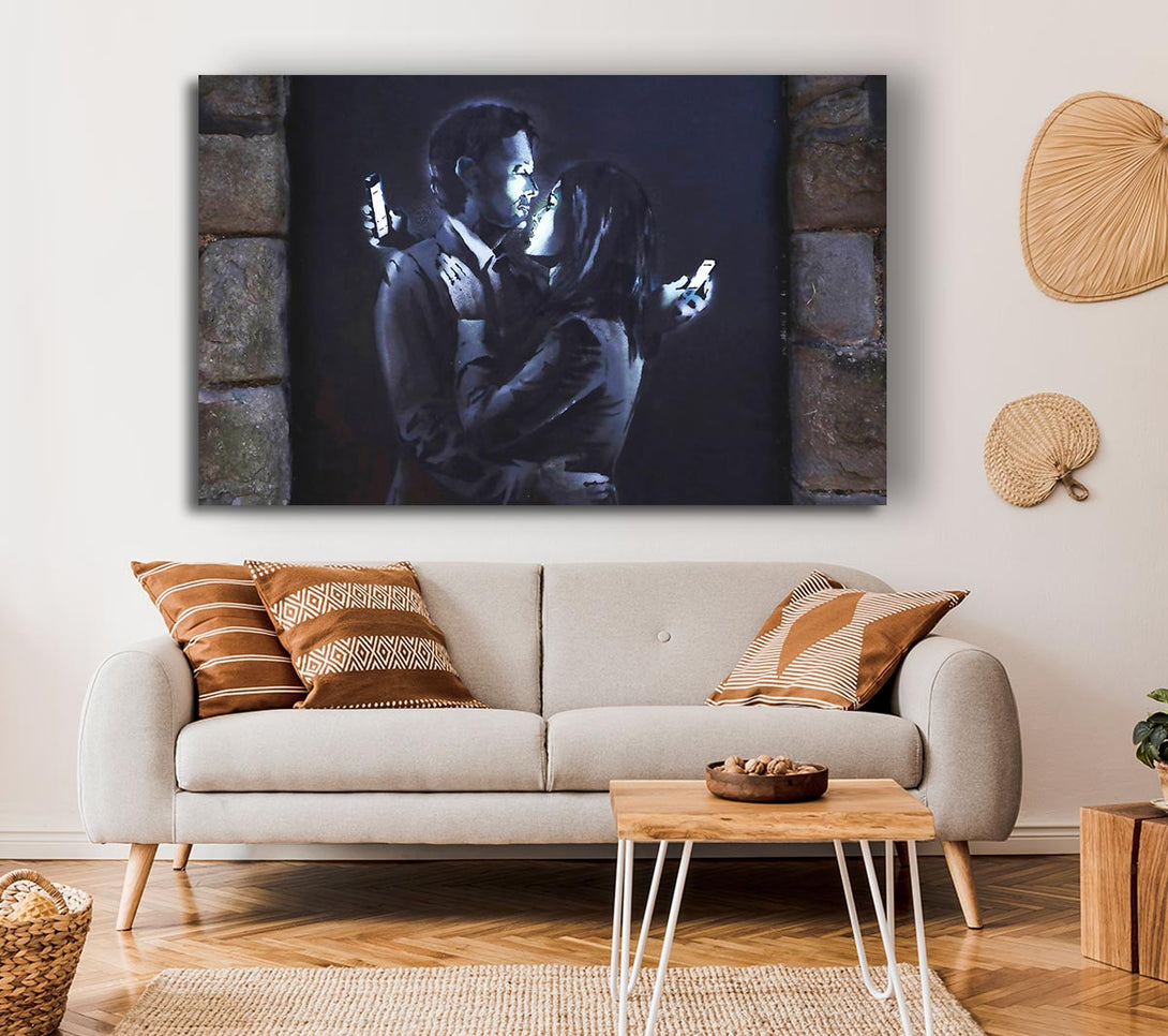  A Canvas Print of Banksy Phones Canvas Print