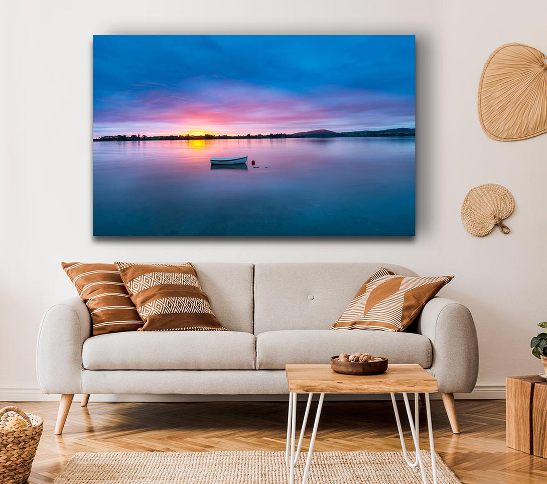  A Canvas Print of Small row boat on calm lake Canvas Wall Art