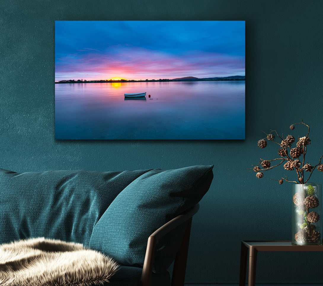  A Canvas Print of Small row boat on calm lake Canvas Wall Art